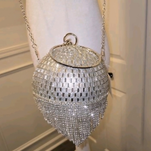 Natasha Couture Handbags - NWT Natasha Couture Silver Glass Crystal Orb Clutch